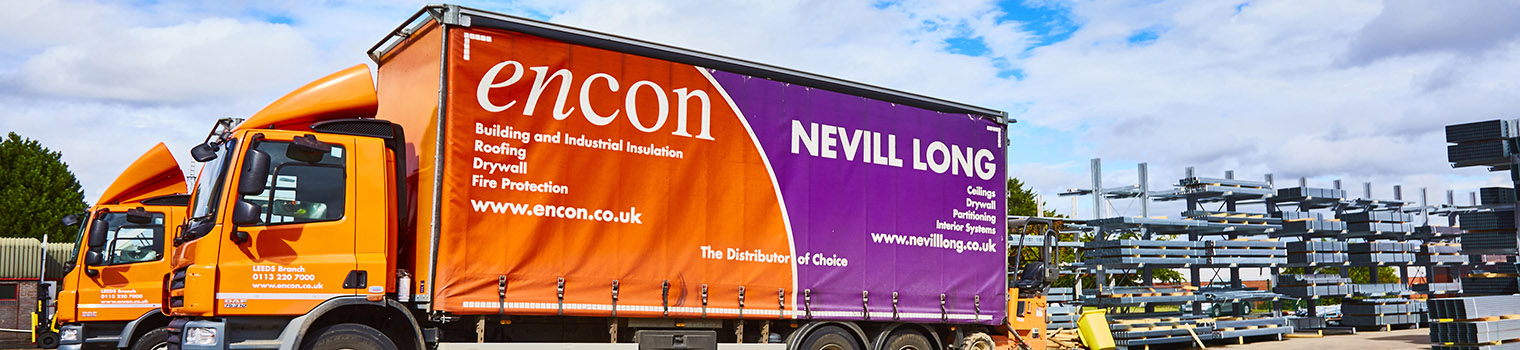 Encon and Nevill Long delivery trucks