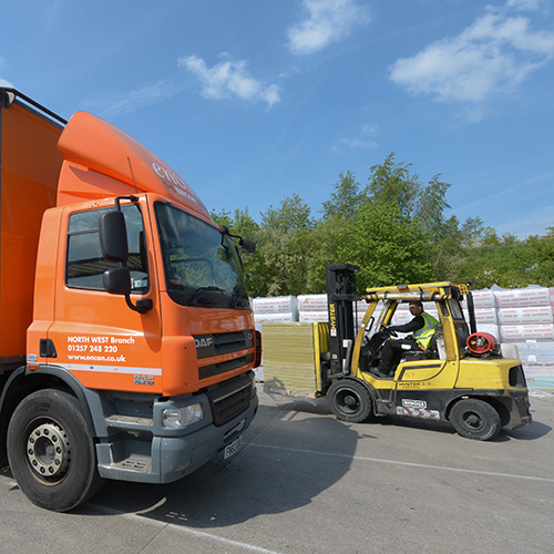 Insulation being loaded onto an Encon truck 