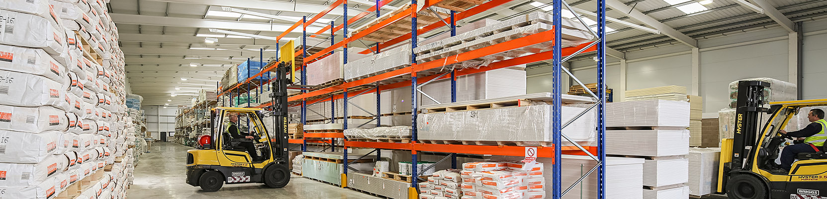 Warehouse operatives collecting stock for customer orders